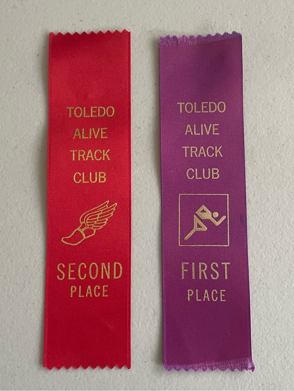 Toledo Alive Track Club First and Second Place Ribbons